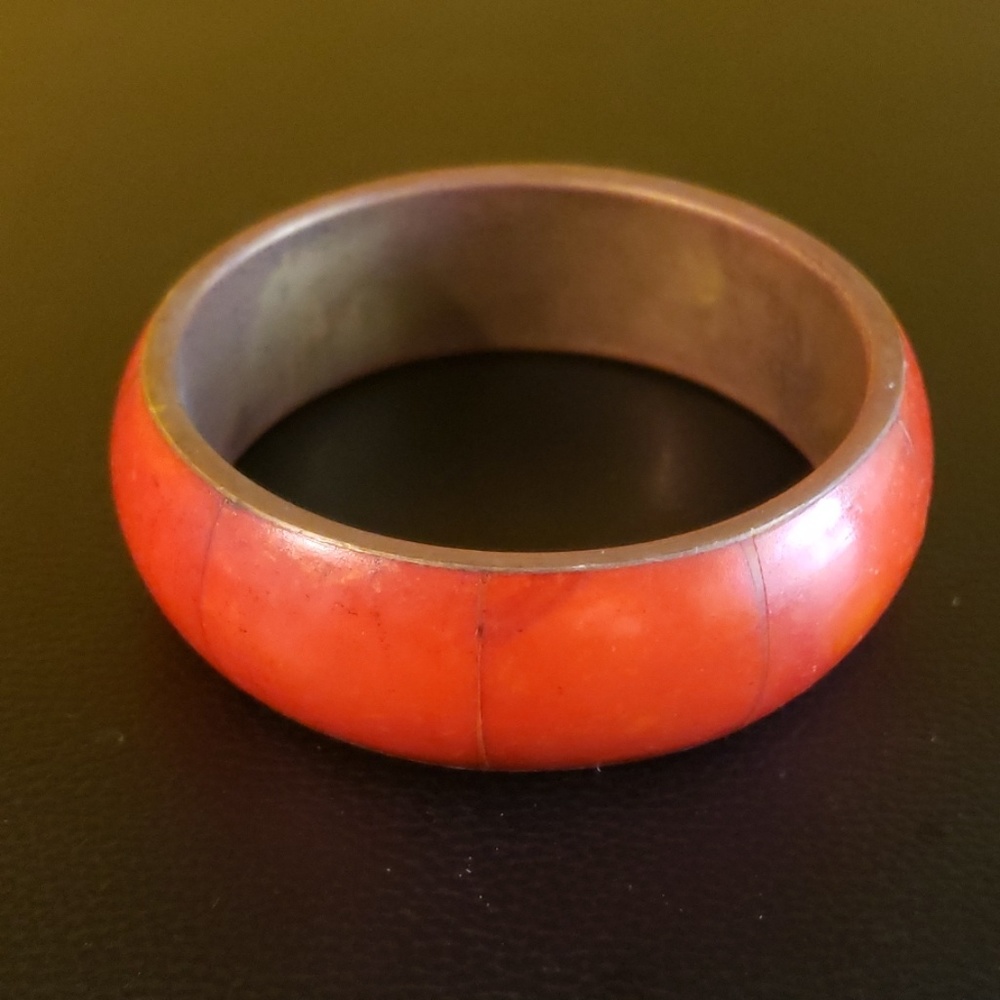 Orange tortious styled bracelet